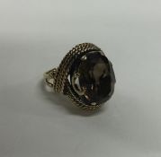 A large 9 carat smoky quartz single stone ring. Ap