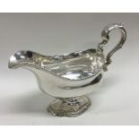 A good George III heavy silver sauce boat with gad