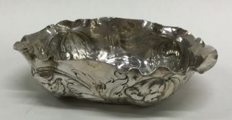A Continental 17th Century chased silver dish deco