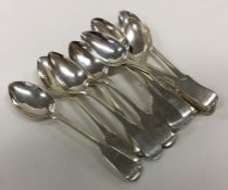 A collection of fiddle pattern silver teaspoons. A