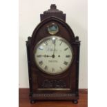 A good Georgian mahogany bracket clock with scroll