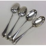 A heavy set of four Edwardian rat tail silver spoo