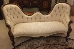 An attractive Victorian upholstered chaise longue