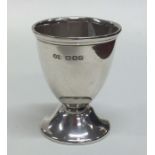 A small Edwardian silver tapering eggcup. London.