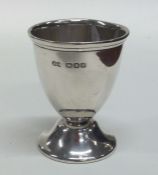 A small Edwardian silver tapering eggcup. London.