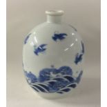 A Chinese urn shaped vase decorated with birds ove