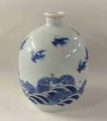 A Chinese urn shaped vase decorated with birds ove