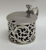 A good Victorian pierced silver mustard pot with e