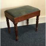A mahogany stool on four reeded supports. Est. £15
