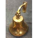 An old wall mounted ship's bell. Est. £20 - £30.