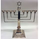 A large good quality silver 9 branch Menorah on sp