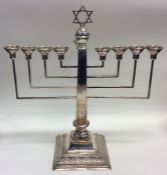 A large good quality silver 9 branch Menorah on sp