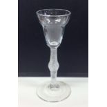 A Georgian air twist wine glass with knobbed stem