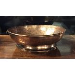 A stylish copper shallow bowl on pedestal foot. Es
