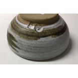 A small stoneware circular bowl of leaf design. Im