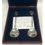 An unusual cased pair of limited edition silver pr