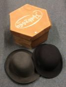 A boxed bowler hat by Pinder & Tuckwell of Exeter,