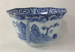 A Chinese octagonal blue and white bowl decorated