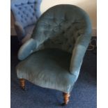 A Victorian button back armchair. Est. £20 - £30.