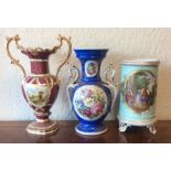 A group of three Victorian vases decorated with gi
