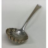 A Georgian silver ladle with fluted bowl. Approx.