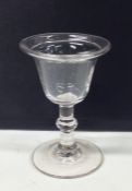 A small Georgian drinking glass with knobbed stem