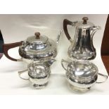 A E JONES: A fine quality silver four piece tea se