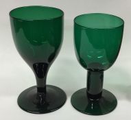 A Georgian green wine glass with tapering body tog