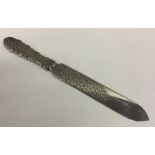 A good quality silver letter opener with engraved