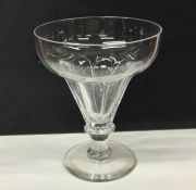 A large Georgian tapering fluted glass drinking ve