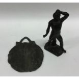 A small bronze figure of a gent together with an o