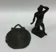 A small bronze figure of a gent together with an o