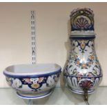 A Portuguese wall mounted pottery samovar together