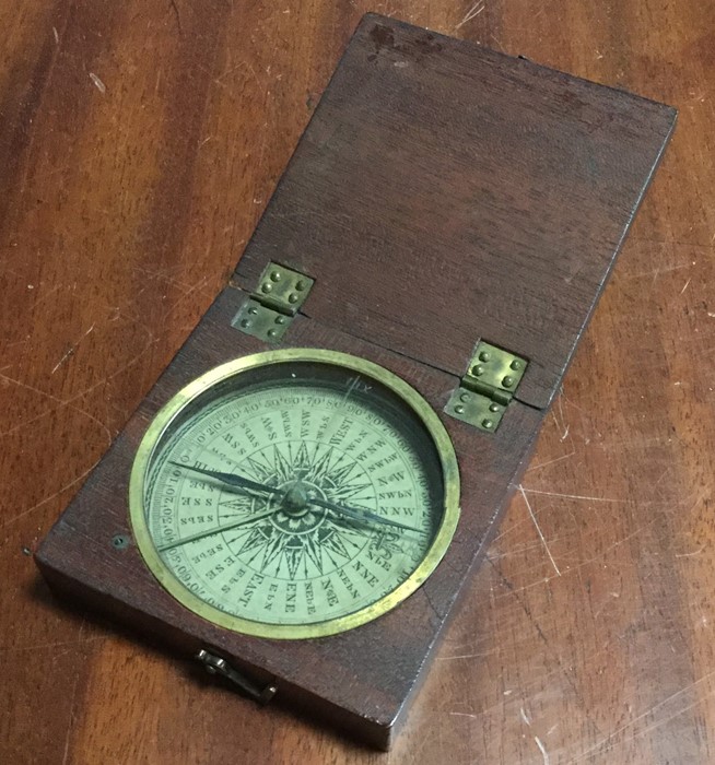 A Georgian style marine compass contained within a