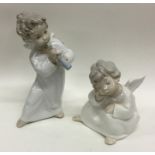 Two Lladro figures of winged infants. Est. £20 - £