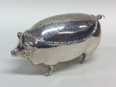 A large rare silver pin cushion in the form of a p