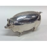 A large rare silver pin cushion in the form of a p