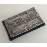 An unusual castle top silver needle case depicting