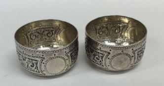A pair of Victorian silver salts with gilt interio