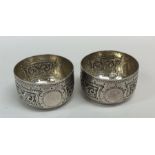 A pair of Victorian silver salts with gilt interio