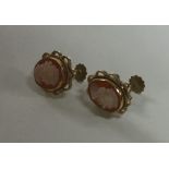 A pair of 9 carat mounted cameo earrings. Approx.