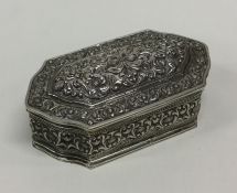 A Persian silver box with embossed decoration to h