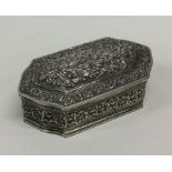 A Persian silver box with embossed decoration to h