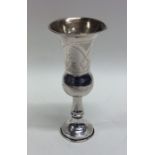 A small Edwardian silver engraved beaker decorated