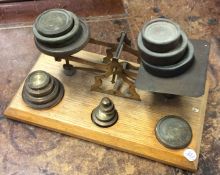 An old set of postal scales and weights. Est. £20
