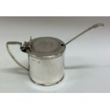 A good George III silver mustard pot with crested