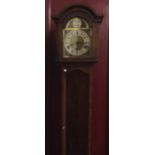 An oak cased grandmother clock on bracket feet. Es