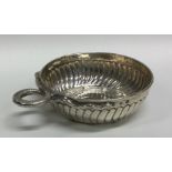 An Antique Continental silver half fluted wine tas