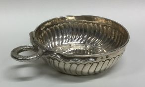 An Antique Continental silver half fluted wine tas