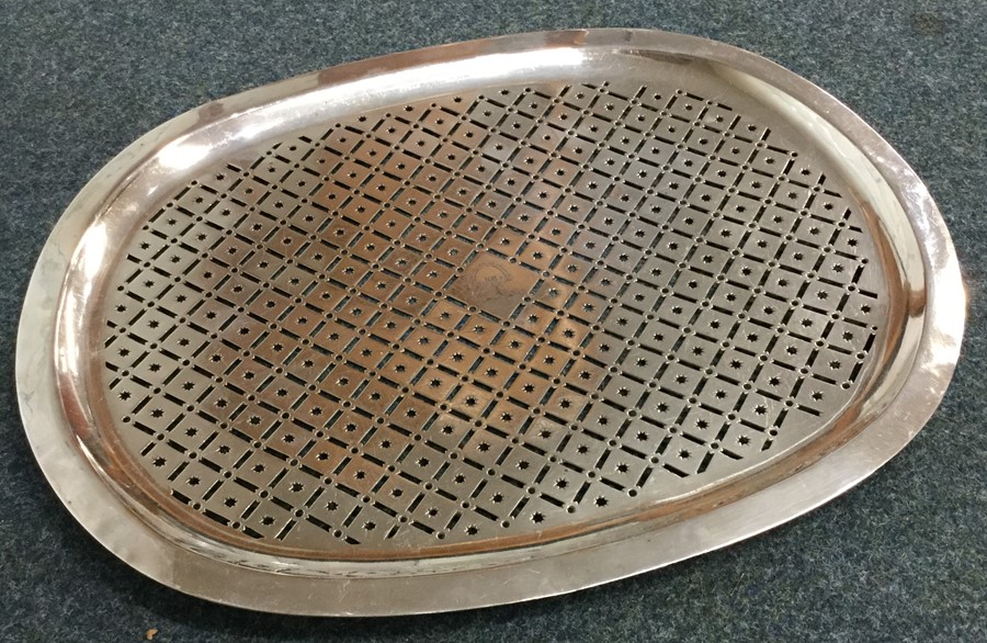 An unusual Georgian silver pierced tray with centr